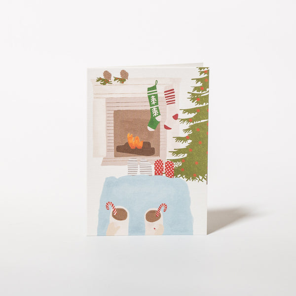 Weihnachtskarte mit Kamin-Motiv von Nelly Castro Design.
