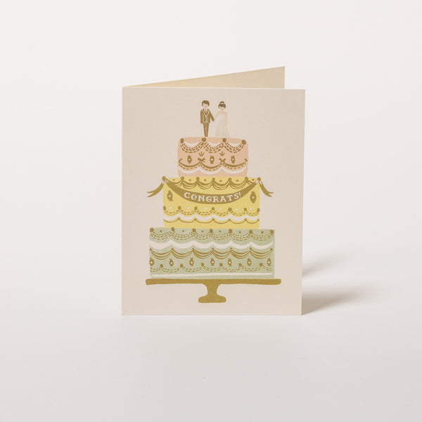 Hochzeitswünsche Karte von Rifle Paper Co. mit dreistöckiger Torte.
